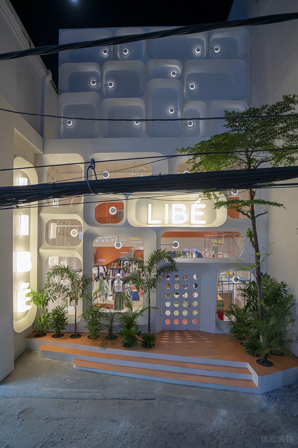 深圳市龍崗區(qū)坪地現(xiàn)代風服裝店libe旗艦裝修設計 外立面夜景