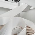 多功能復(fù)合空間展廳裝修設(shè)計 白色調(diào)螺旋樓梯