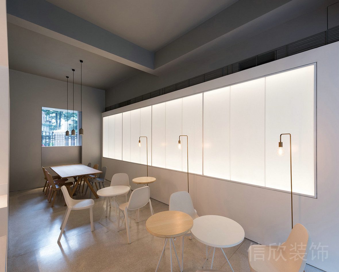 圓桌設(shè)計(jì)鏤空墻體燈飾效果店鋪就餐區(qū)餐廳設(shè)計(jì)